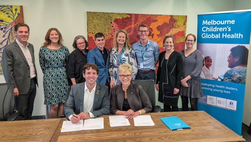 Ambassador for Global Health Lucas de Toca and MCRI CEO Kathryn North (seated) Molly Sullivan, Fiona Russell, Hamish Graham, Margie Danchin, Andrew Steer, Myra Hardy, Susanna Lake (behind).